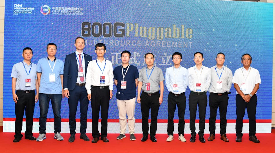 Company representatives line up at the 800G Pluggable MSA Launch Event at CIOE.