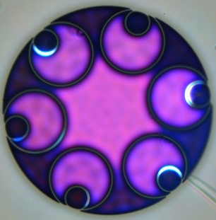 Lumenisity's hollowcore fiber uses air in the core rather than glass.