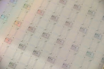 The Lightmatter Passage wafer-scale, programmable photonic interconnect fabric.