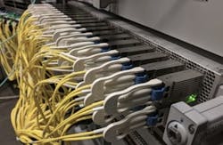 Shown are 36 NeoPhotonics QSFP-DD 400ZR modules operating in an Arista Networks switch.