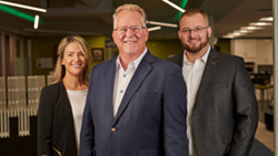 OTTC President Paul Griswold is flanked by OTTC Director of Customer Operations & Marketing Ashley Gustafson (left) and Brendan Griswold, new manager of solutions development and project management at Upstate Fiber Networks.