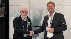 David J. Hagan, Pegasus Professor and Dean at CREOL (left), shakes hands with ficonTEC CEO Torsten Vahrenkamp at Photonics West 2022, to seal the agreement for the new joint facility located within UCF/CREOL. David J. Hagan, Pegasus Professor and Dean at CREOL (left), shakes hands with ficonTEC CEO Torsten Vahrenkamp at Photonics West 2022, to seal the agreement for the new joint facility located within UCF/CREOL.