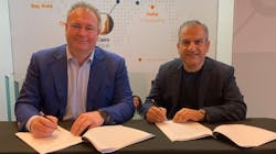 Peter van Burgel (left), CEO of AMS-IX, and Al Daylami, CEO of AIM, at the agreement signing. Peter van Burgel (left), CEO of AMS-IX, and Al Daylami, CEO of AIM, at the agreement signing.