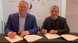 Peter van Burgel (left), CEO of AMS-IX, and Al Daylami, CEO of AIM, at the agreement signing.