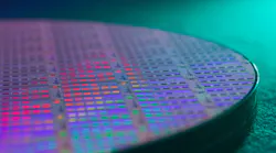 A 300-mm wafer of Ayar Labs TeraPHY optical I/O chiplets. The latest funding round will help the company ramp production.