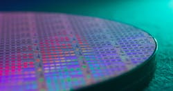 A 300-mm wafer of Ayar Labs TeraPHY optical I/O chiplets. The latest funding round will help the company ramp production. A 300-mm wafer of Ayar Labs TeraPHY optical I/O chiplets. The latest funding round will help the company ramp production.