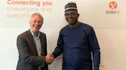 International Partnership Director Onno Bos (left) of AMS-IX and Oluwasayo Oshadami (right), GM, Technical Solutions, MainOne, signed the deal during the African Peering Forum (AfPIF) in Kigali.