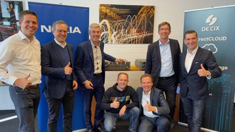 Nokia and DE-CIX teams mark the 800GbE implementation. From left to right: Sebastian Seifert, CFO at DE-CIX; Thomas King, CTO at DE-CIX; Rafael de Ferm&iacute;n, vice president of the Network Infrastructure business in Europe at Nokia; Marco Zietz, senior architect network design at DE-CIX; Matthias Hahn, sales director at Nokia; Wolfgang Seibert, head of customer team Germany at Nokia; Ivo Ivanov, CEO at DE-CIX.