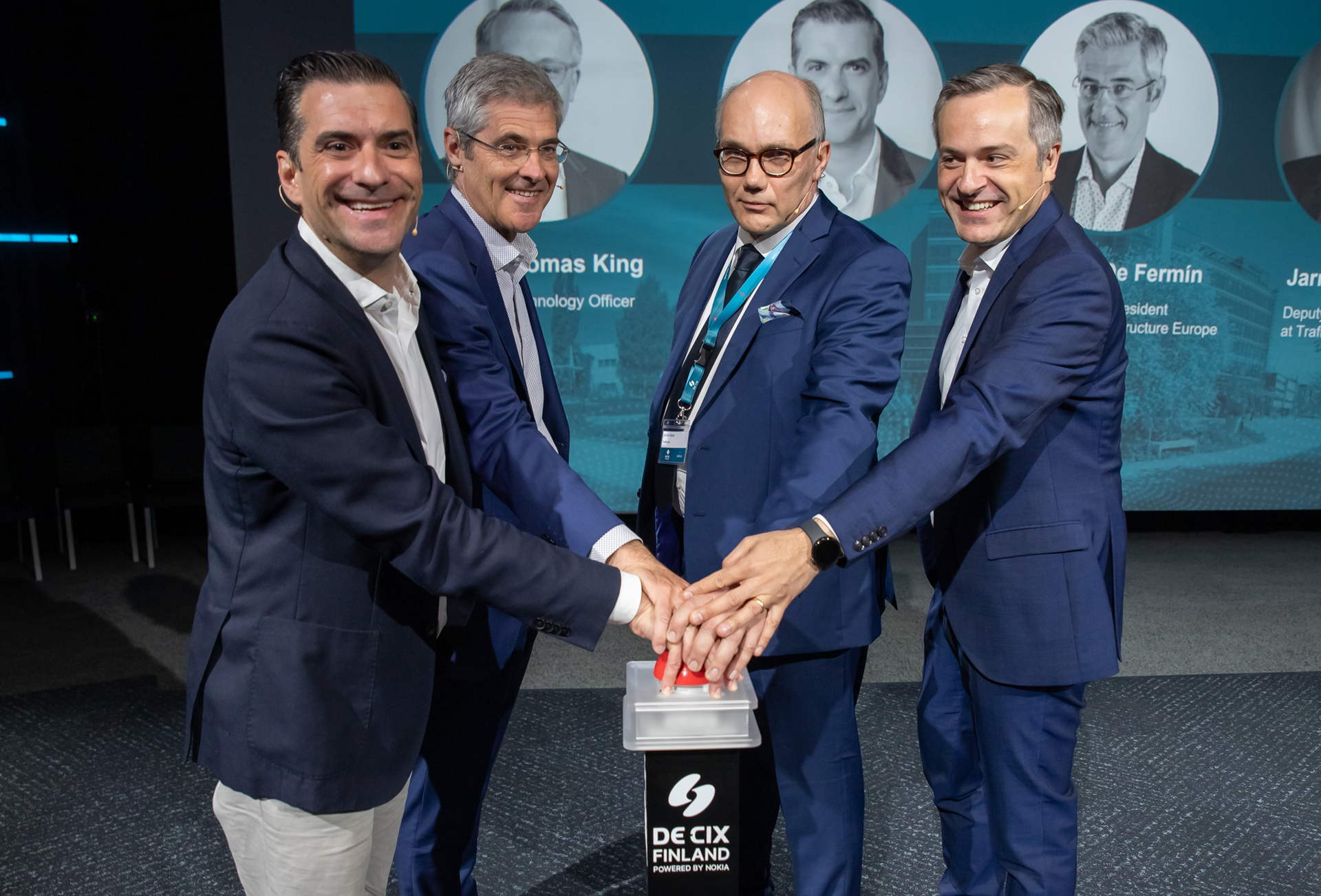 Representatives of DE-CIX and Nokia celebrate the opening of DE-CIX's newest internet exchange in Finland.