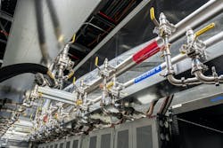 A row of liquid cooled cabinets at an Equinix IBX. A row of liquid cooled cabinets at an Equinix IBX.