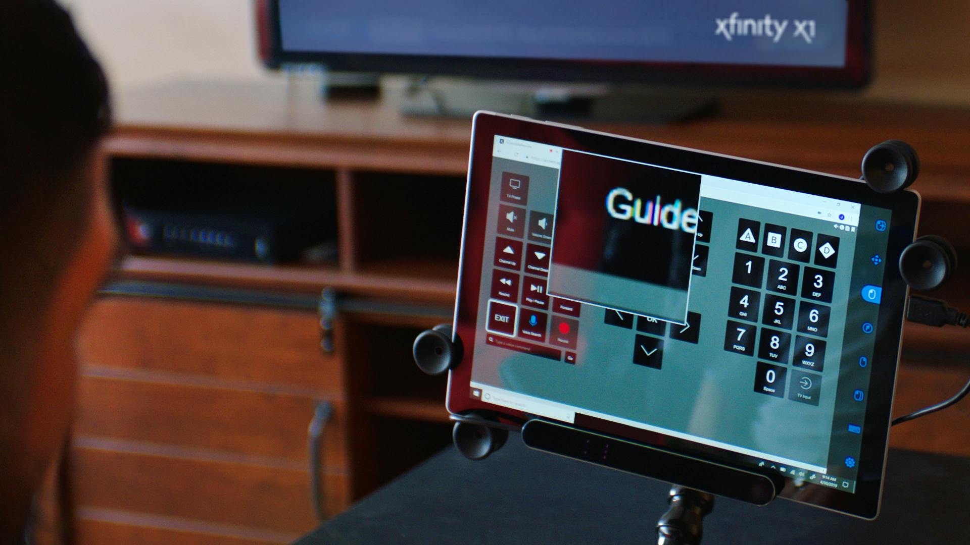 Comcast&rsquo;s Xfinity Adaptive Remote experience as displayed on a tablet.