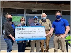 Representatives from the Conway County Care Center accept a $2,500 donation from Ritter Communications Marketing Coordinator Melissa Cole (far left) and Ritter Communications Sales Representative Oni Robertson (far right). Representatives from the Conway County Care Center accept a $2,500 donation from Ritter Communications Marketing Coordinator Melissa Cole (far left) and Ritter Communications Sales Representative Oni Robertson (far right).