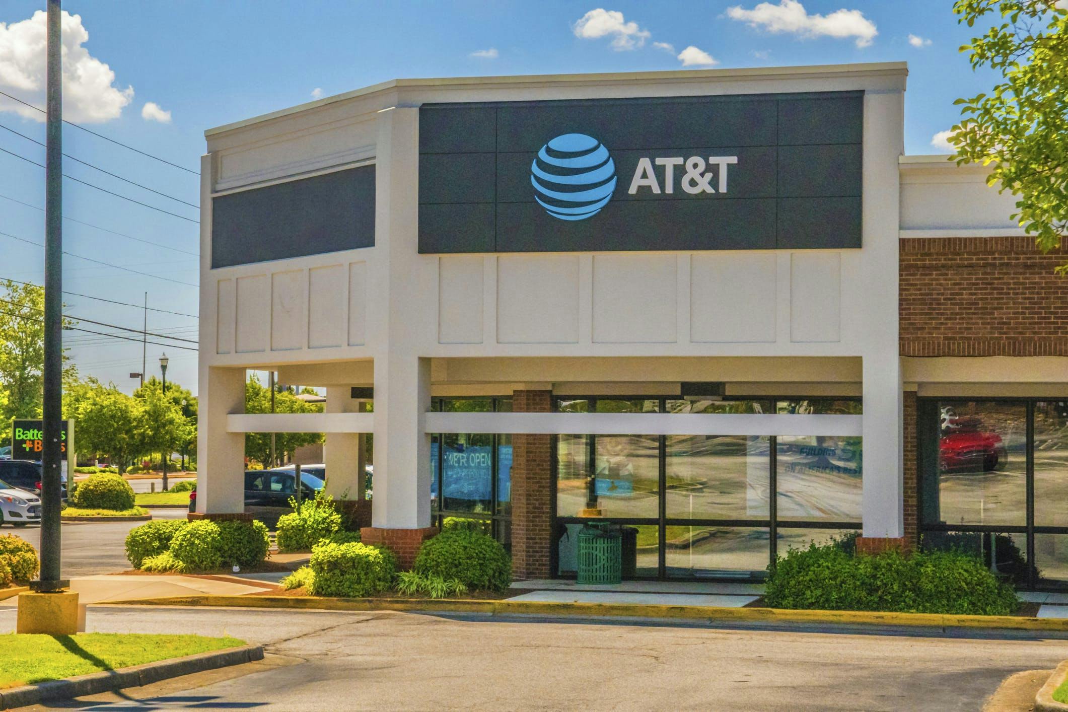 AT&T said it could extend fiber beyond its 30 million location target.