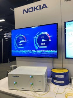 Achieving 100 Gb/sec transmission on a single PON wavelength, Nokia showcased its 100G PON broadband technology at the Fiber Connect 2022 exhibition (July 12-15) in Nashville, Tenn. Achieving 100 Gb/sec transmission on a single PON wavelength, Nokia showcased its 100G PON broadband technology at the Fiber Connect 2022 exhibition (July 12-15) in Nashville, Tenn.