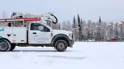 An Alaska Communications field technician drives through North Pole, Alaska.