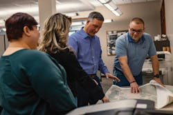 Pellegrini conducts a planning session with his GIS team. Pellegrini conducts a planning session with his GIS team.