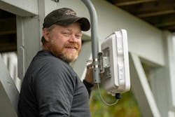 Alaska Communications technician, Travis, delivers broadband service to a customer’s home in Soldotna. Photo courtesy of Alaska Communications. Alaska Communications technician, Travis, delivers broadband service to a customer’s home in Soldotna. Photo courtesy of Alaska Communications.