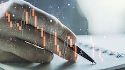 Double exposure of a world map hologram over a hand writing in a notebook. Double exposure of a world map hologram over a hand writing in a notebook.