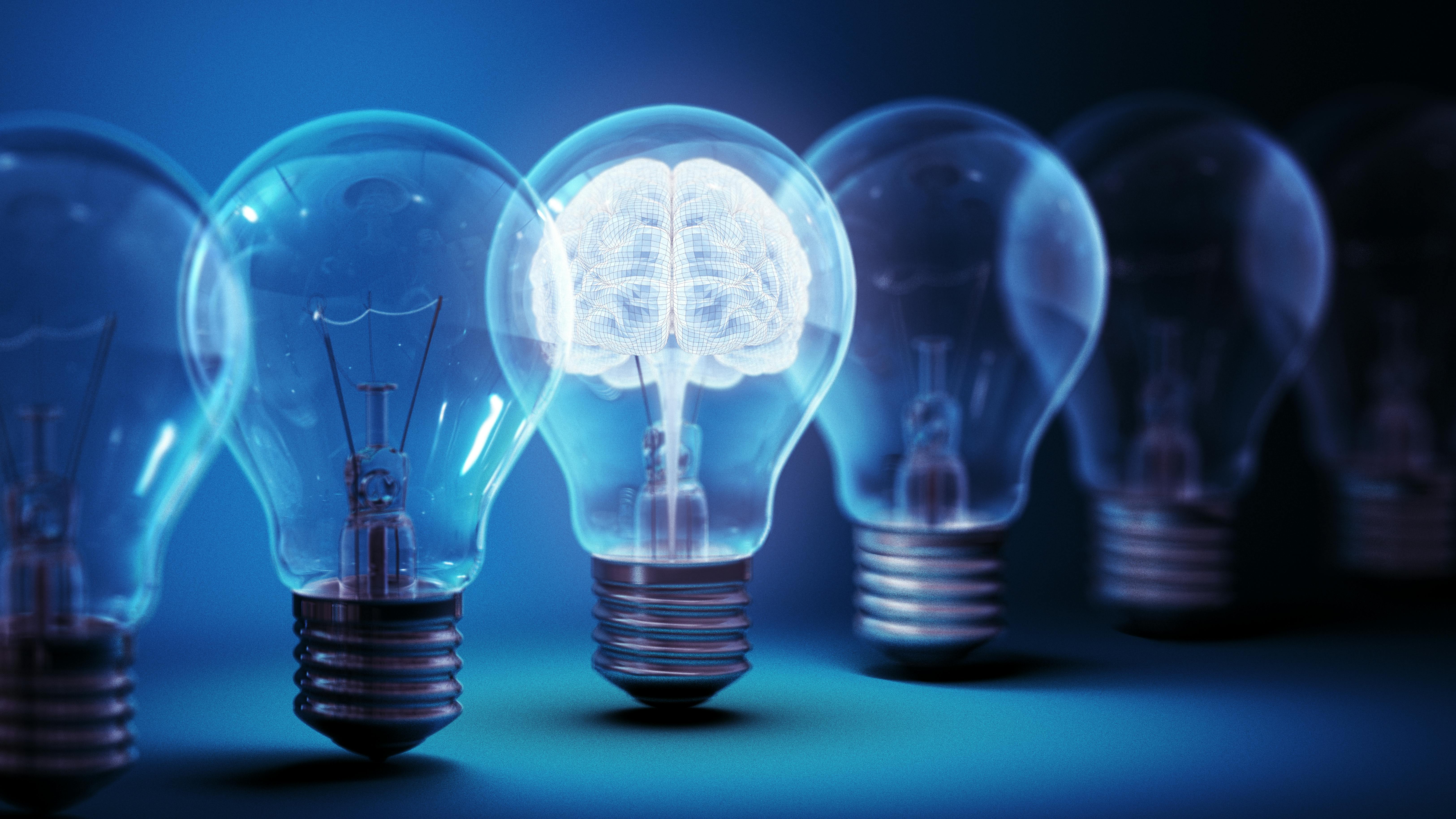 A brain in a lightbulb, representing artificial intelligence.