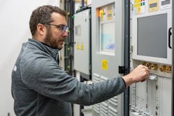 An Alaska Communications technician inspects new power feed equipment (PFE) and one of the company’s cable landing stations. An Alaska Communications technician inspects new power feed equipment (PFE) and one of the company’s cable landing stations.