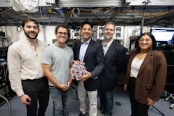 Gaurav Dhamija (center), Senior Director of Technology and Strategy at Belden, and Tim Waters (second from right), Architecture and Technology at Belden, visit the laboratory of David Awschalom at the University of Chicago’s Pritzker School of Molecular Engineering. Leading the tour were (from left) graduate student José A. Méndez Méndez, postdoctoral scholar Cyrus Zeledon, and graduate student Swathi Chandrika. (Image by Anne Ryan for the CQE). Gaurav Dhamija (center), Senior Director of Technology and Strategy at Belden, and Tim Waters (second from right), Architecture and Technology at Belden, visit the laboratory of David Awschalom at the University of Chicago’s Pritzker School of Molecular Engineering. Leading the tour were (from left) graduate student José A. Méndez Méndez, postdoctoral scholar Cyrus Zeledon, and graduate student Swathi Chandrika. (Image by Anne Ryan for the CQE).