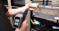 Viavi's INX-760 AI-enabled probe microscope undertaking inspection of an MPO connector. Viavi's INX-760 AI-enabled probe microscope undertaking inspection of an MPO connector.