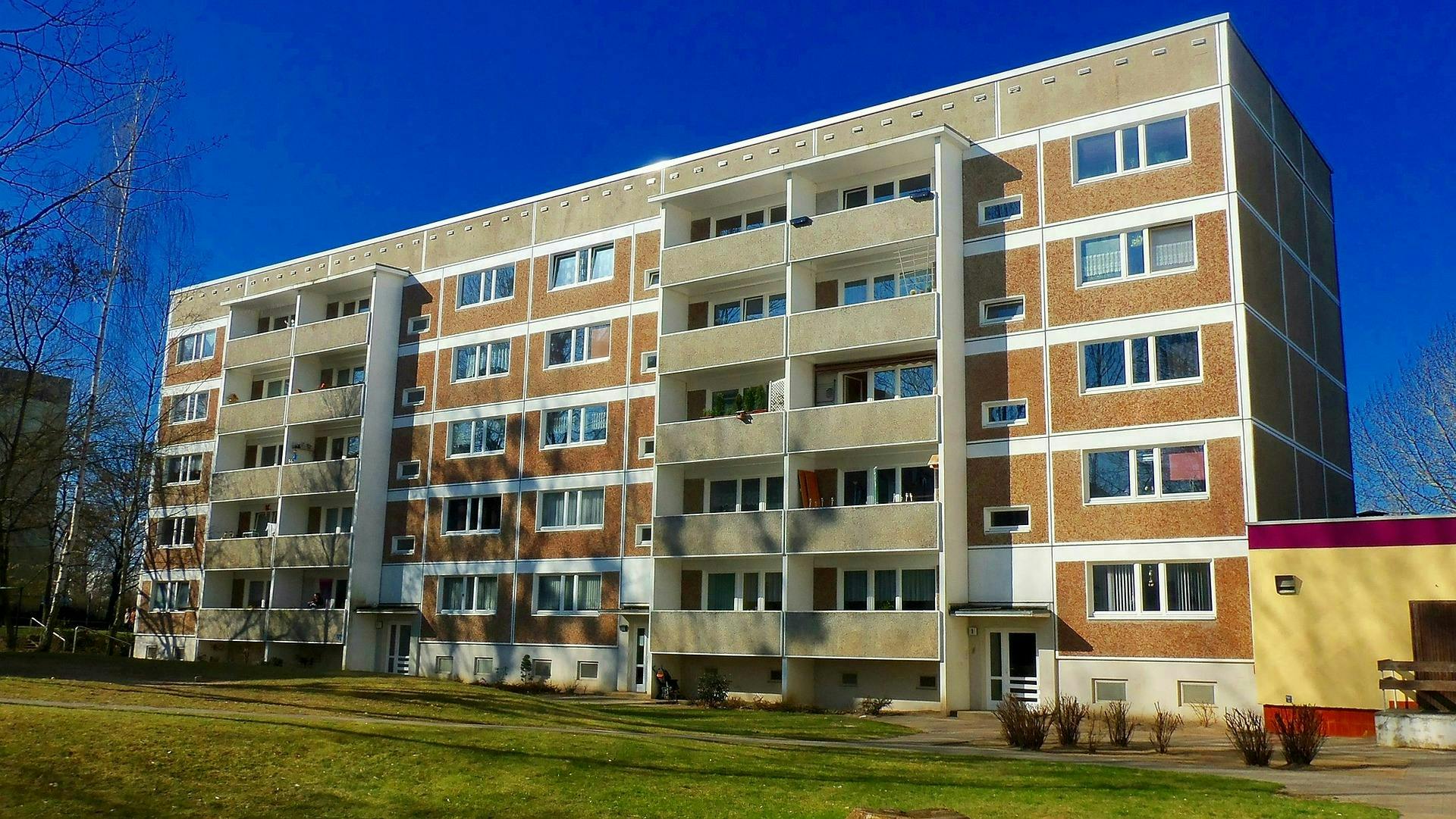66304862cd13c900081d9ff0appartment_building_835817